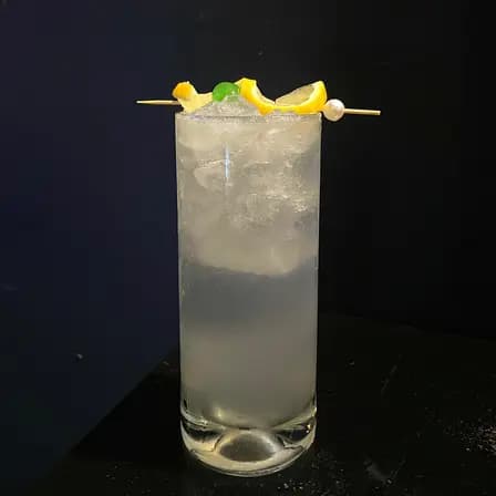 TOM COLLINS.